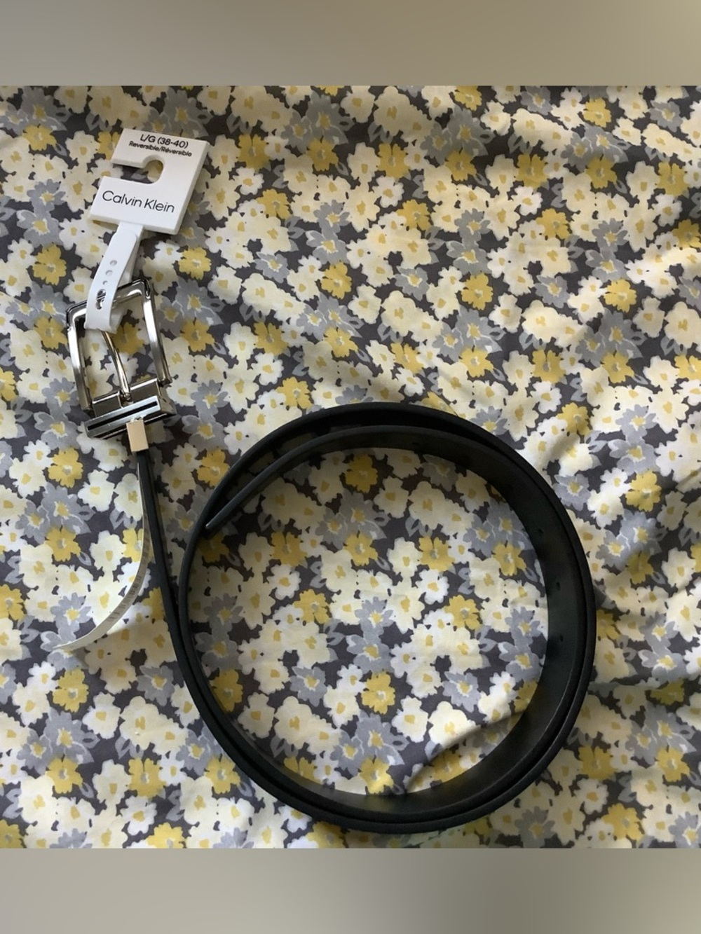 Calvin Klein Men’s Reversible Belt in Black and White with Silver Buckle